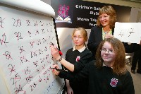 Jane Davidson with Caitlin Thomas and Alice Davies of Coedylan Comprehensive School